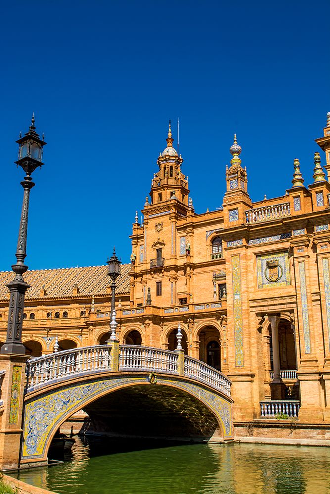 Bridge over the canal at Plaza de Espana, Seville, Andalusia, Spain.